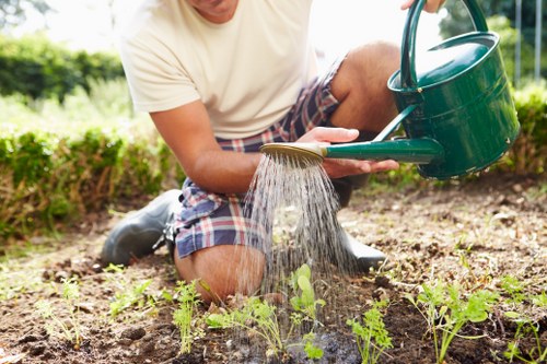 Landscape supervisor checking completed garden work